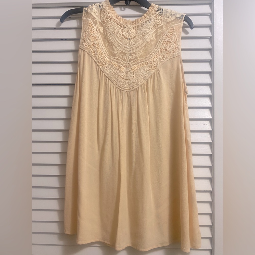 Light yellow sleeveless tunic